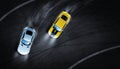 3D rendering aerial top view two cars drifting battle the night time on race track