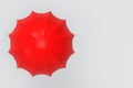 3d rendering. aerial view of single plastic red umbrella on copy space gray background