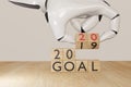 2020, 3d rendering ai artificial intelligent robot hand flip the wooden cube with change the year from goal 2019 to happy new year