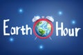 3d rendering of an alarm-clock with planet Earth instead of the clock-face with the title `Earth Hour`.