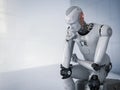 Robot sit down and thinking Royalty Free Stock Photo