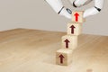 3d rendering artificial intelligence robot hand flip the growth wooden cube concept to make growth in business