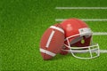 3d rendering of a ball and a helmet for the game of American football on the green grass of a football pitch. Royalty Free Stock Photo