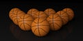 3d rendering basketballs on black background