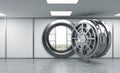 3D rendering of a big open round metal safe in a bank depository Royalty Free Stock Photo