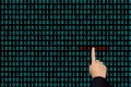 3d rendering binary code screen with a finger pointing at the problems
