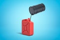 3d rendering of black metal barrel with black liquid pouring into red gasoline can on blue background Royalty Free Stock Photo