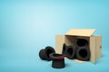 3d rendering of black top hats falling out of a carton box on blue background Royalty Free Stock Photo