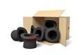 3d rendering of black top hats falling out of a carton box Royalty Free Stock Photo