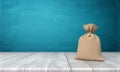 3d rendering of a blank tied up hessian bag full of money standing on a wooden surface on blue background.