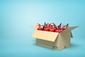 3d rendering of cardboard box full of red fire extinguishers on blue background.