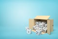 3d rendering of cardboard box lying sidelong full of white dice with black spots on blue background. Royalty Free Stock Photo