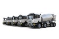 3D Rendering of Cement Mixer Trucks in a Row Royalty Free Stock Photo