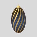 Christmas oval blue gold ball isolated on a light grey background.