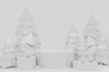 3D rendering of Christmas trees and a platform for a product demonstration on a gray background Royalty Free Stock Photo
