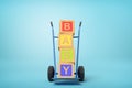 3d rendering of colorful alphabet toy blocks showing `BABY` sign on a hand truck on blue background Royalty Free Stock Photo