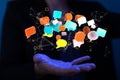 3D rendering colorful flying email icons and web flying in a man's hand