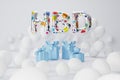 3d rendering. colorful text HBD, blue gift box and white balloons, composition on white background.