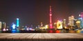 Colorful wooden platform landscape: Huangpu river at night, Shanghai, China. Royalty Free Stock Photo