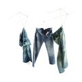 3D rendering of denim jeans, suspended from hooks isolated on a white background.