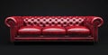 A 3D rendering depicts a red leather chester sofa situated on a black background with a reflective finish Royalty Free Stock Photo