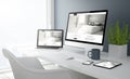 grey studio devices with hotel website