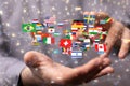 3d rendering of digital figures of world flags above businessmans hands,concept of global connection