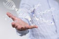 3d rendering of DNA strands hologram on a genetic engineer's palm
