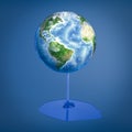 3d rendering of earth globe with blue thick liquid melting off on blue background