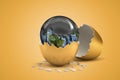 3d rendering of earth globe covered with black thick liquid hatching out of golden egg on yellow background Royalty Free Stock Photo