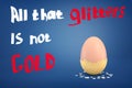 3d rendering of an egg with coat of dry golden paint half-fallen off with the title `All that glitters is not gold`.