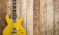 3d rendering electrical guitar near brown wooden wall with ivy