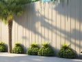 A 3d rendering of an empty outside wooden wall with a tropical-style garden, a tropical-style tree, and sunlight.