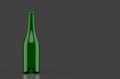 3d rendering. Empty transparent  red wine bottle green glass on dark gray background Royalty Free Stock Photo