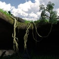 3d illustration of a fantasy cave entrance with a colorful sky