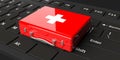 3d rendering first aid kit on a black keyboard