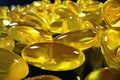 3D Rendering Fish Oil. Omega 3, omega 6, omega 9, vitamin D. Pile of capsules Omega 3 on black background, Cod Liver