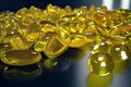 3D Rendering Fish Oil. Omega 3, omega 6, omega 9, vitamin D. Pile of capsules Omega 3 on black background, Cod Liver Royalty Free Stock Photo