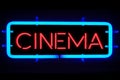 3D rendering flickering blinking red blue neon sign on black background, cinema movie film entertainment sign Royalty Free Stock Photo