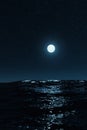full moon over ocean surface Royalty Free Stock Photo