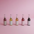 3d rendering 5 glass bottles of water with white labels, pink background,minimal style,pastel colour