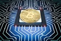 Gold bitcoin on circuit board