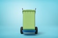 3d rendering of green trash can on blue hand truck which is standing in half-turn on light-blue background with copy