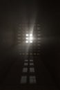 3d rendering of grunge ancient prison cell illuminated from light rays