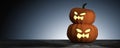 3D Rendering : Halloween head jack-o-lantern pumpkin on wooden floor with light drop background.halloween concept