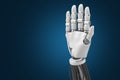 3d rendering Hands of Tomorrow, Dive into the Future as the Robotic Hand, Illuminated on a blue Background, Propels Us into an Era