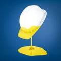 3d rendering of a hard hat which has been dipped in yellow paint with a paint puddle below.