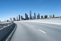3d rendering Highway overpass motion blur with modern city Royalty Free Stock Photo