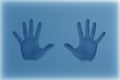 3d rendering Human palm leaning against the embossed glass in blue tones