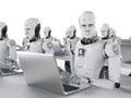 Robots work on laptop Royalty Free Stock Photo